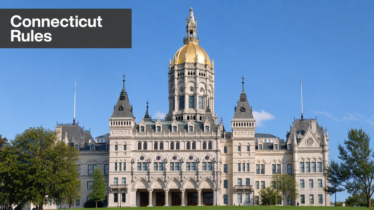 The historic Connecticut State Capitol building features a golden dome and intricate architectural details under a clear sky.